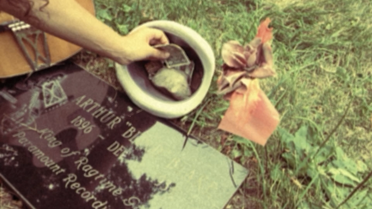 Kitty and Jack Norton singing at Blind Blake's grave in Milwaukee, Wisconsin.