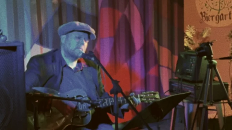 Jack Norton sings "Get On The Train" at Peter's Biergarten in Winona, Minnesota